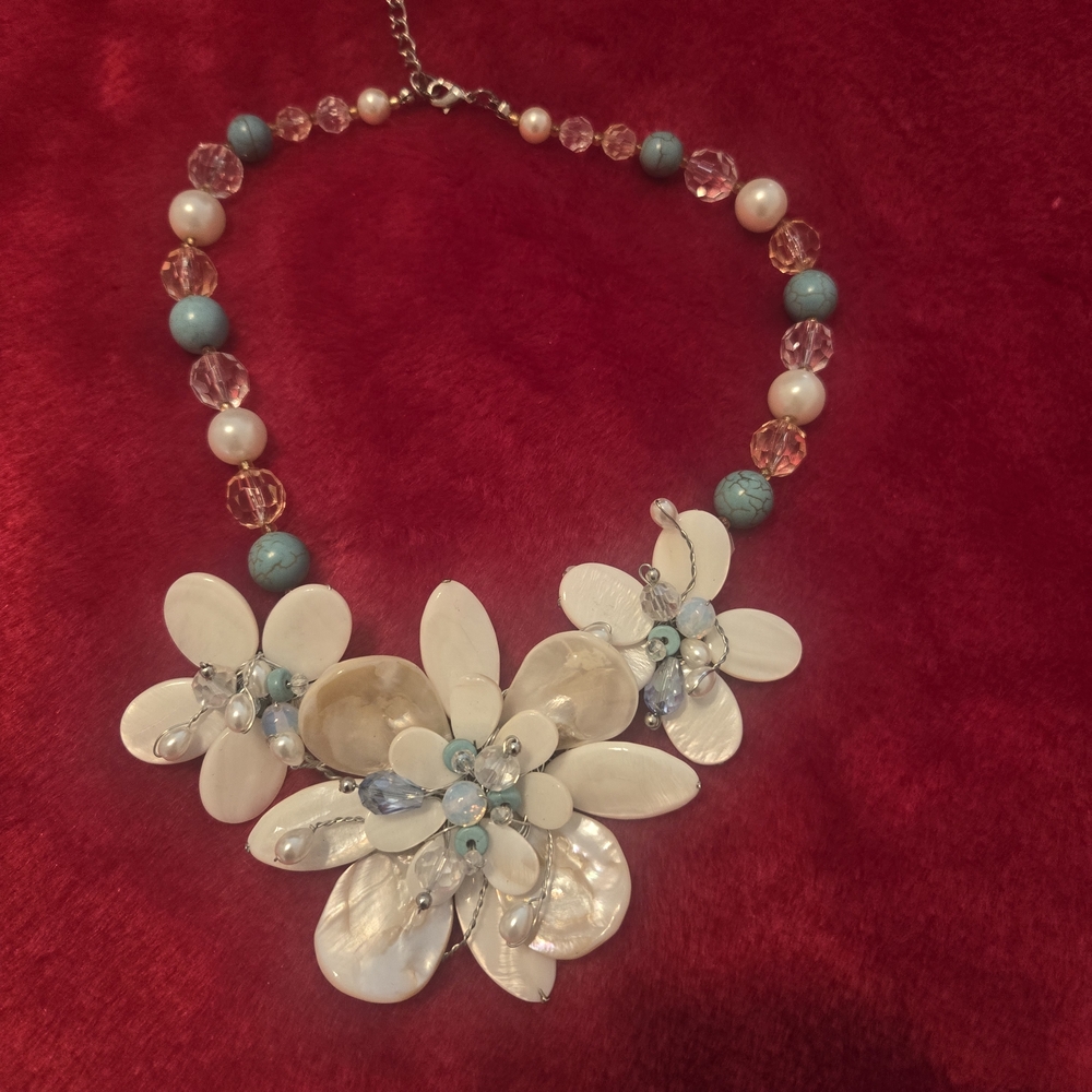 Elegant Floral Necklace with White and Blue Accents